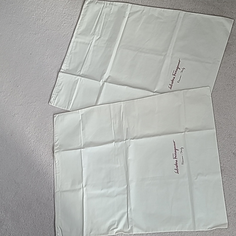 New Salvatore Ferragamo boots dust bags.